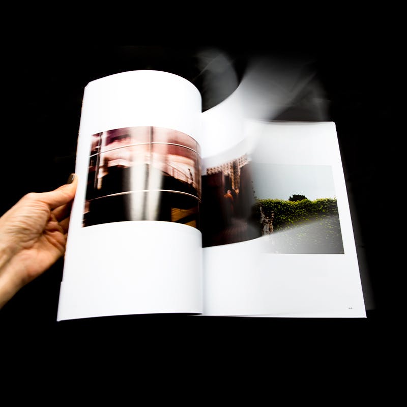 Image of a book being flipped through pages