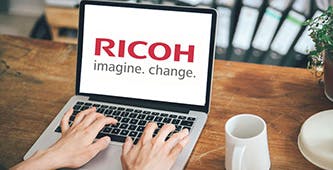 laptop with RICOH imagine. change. logo on the screen
