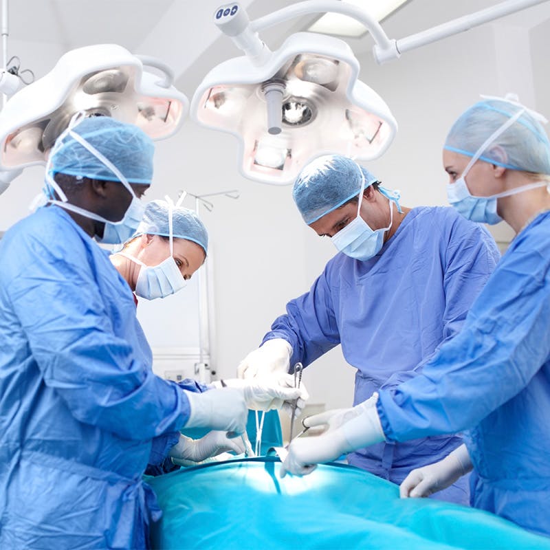 Medical staff in a surgery room, operating.