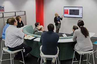 group of people reviewing a presentation
