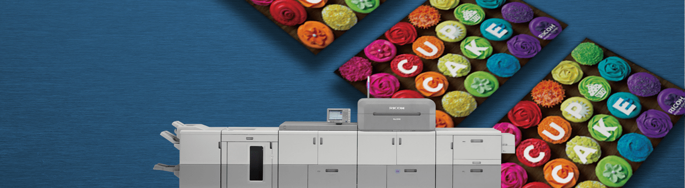 Cutsheet printer with cupcake postcards in background