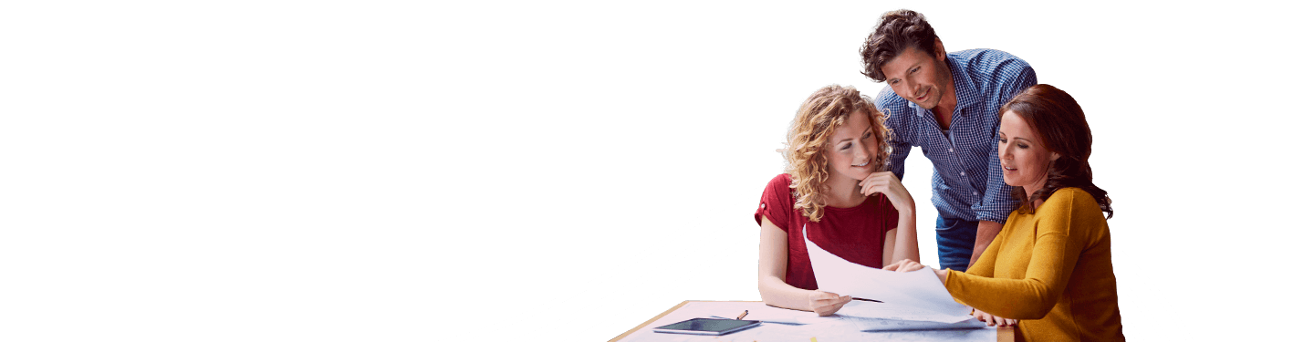 Team collaborating with tablet and print outs at a desk