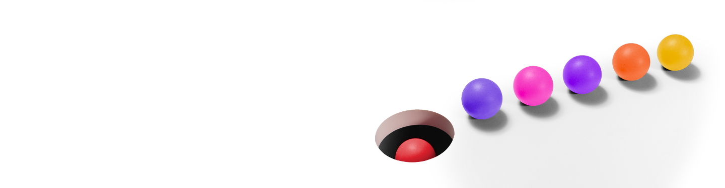 muli colored balls with one red one falling into a hole