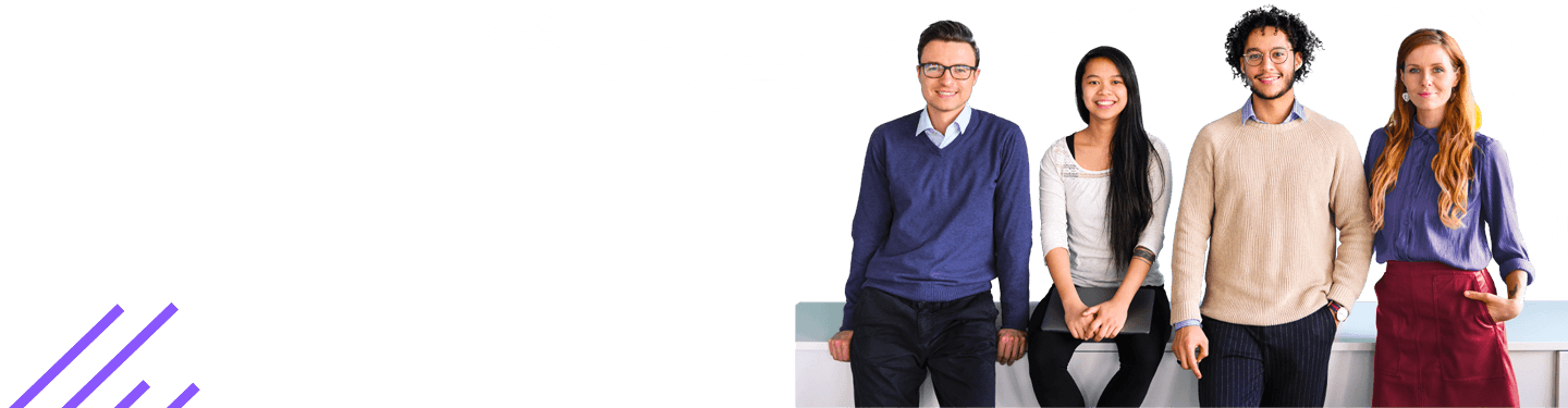 Portrait Of Office Colleagues Standing In Front Of Partition Wall