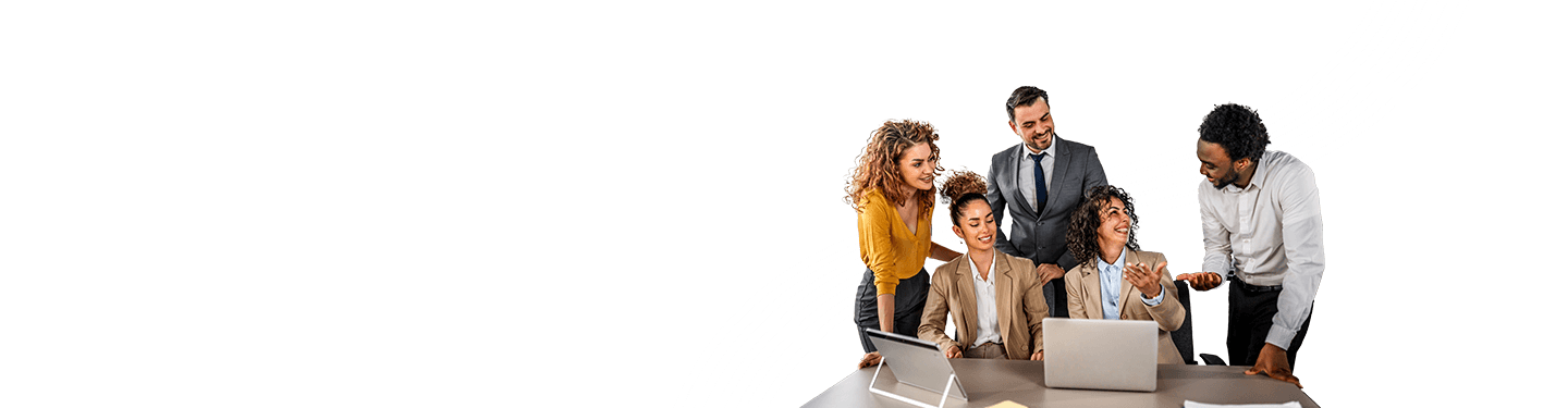 A group of working professionals on their laptops discussing implementation services