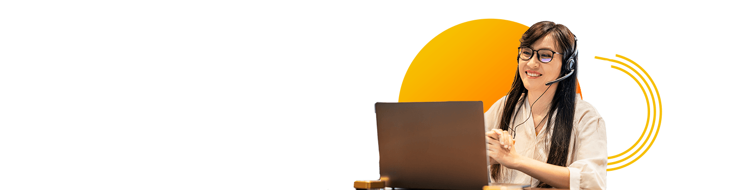 Professional using a headset while working on a laptop, representing customer service roles, client support, and real-time communication.