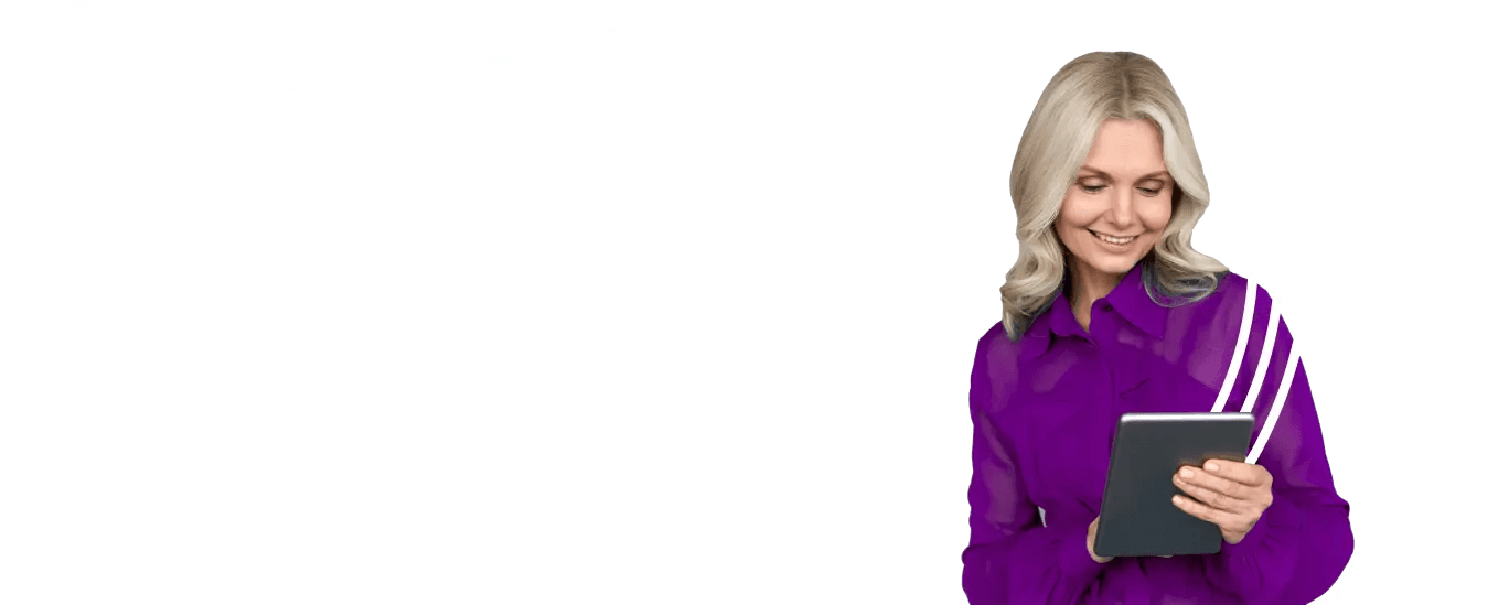 Woman in purple shirt looking at a tablet
