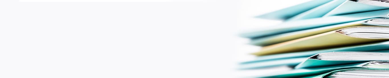 Photo of a stack of folders.