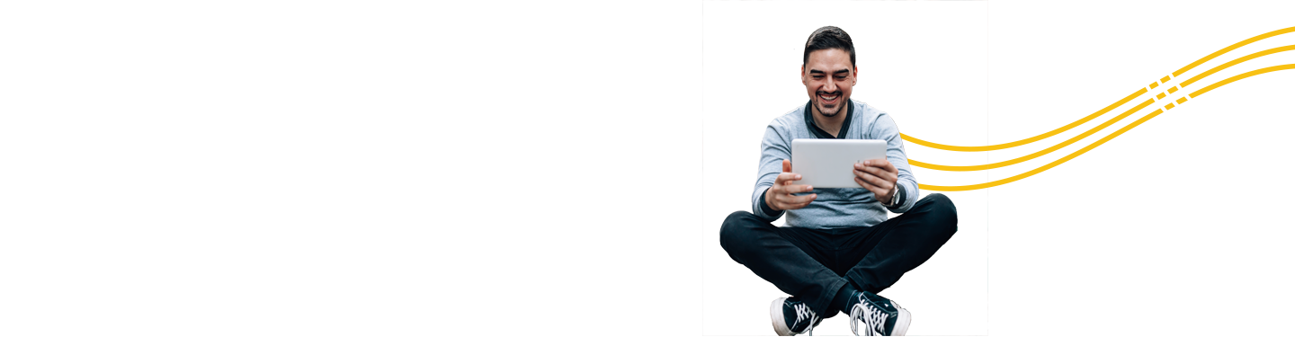 Man working on tablet while sitting down