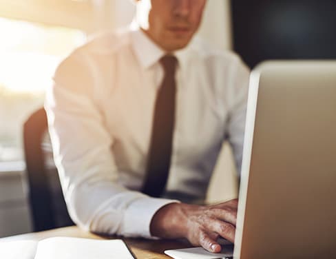 Professional working at a computer