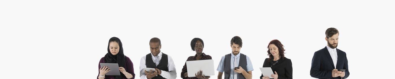 Business people using cell phones, digital tablets and laptop in a row against white background