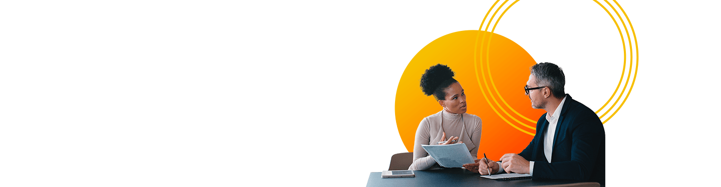 A woman and man discussing advisory services in order to Identify and solve operational, change readiness, and governance gaps with trusted expertise.
