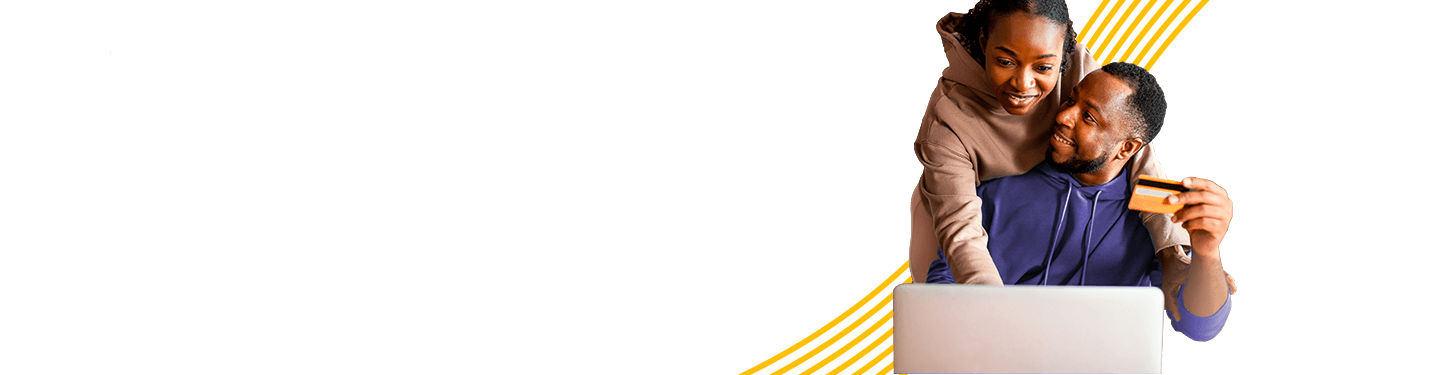 Man and woman in front of a laptop holding a credit card and making an online purchase