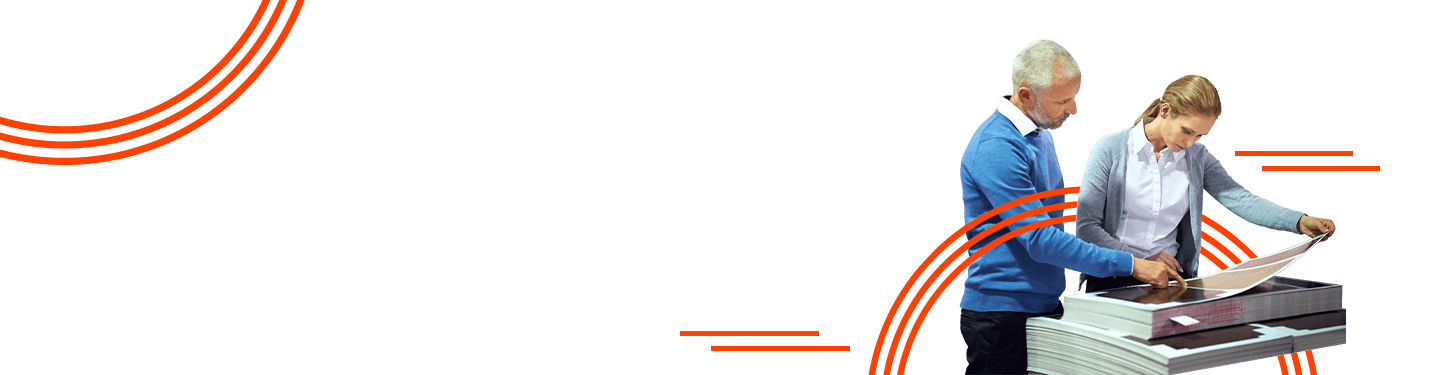 Man and woman looking at the best printing strategies and practices