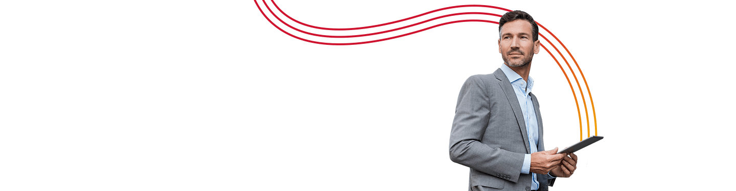 Business man holding tablet looking over his shoulder