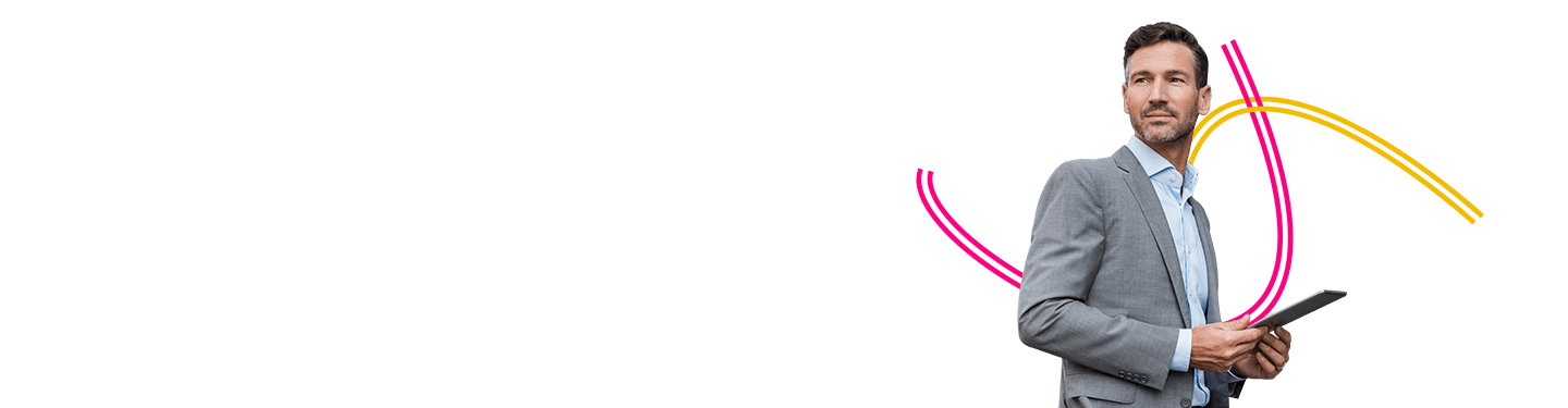 Business man holding tablet looking over his shoulder