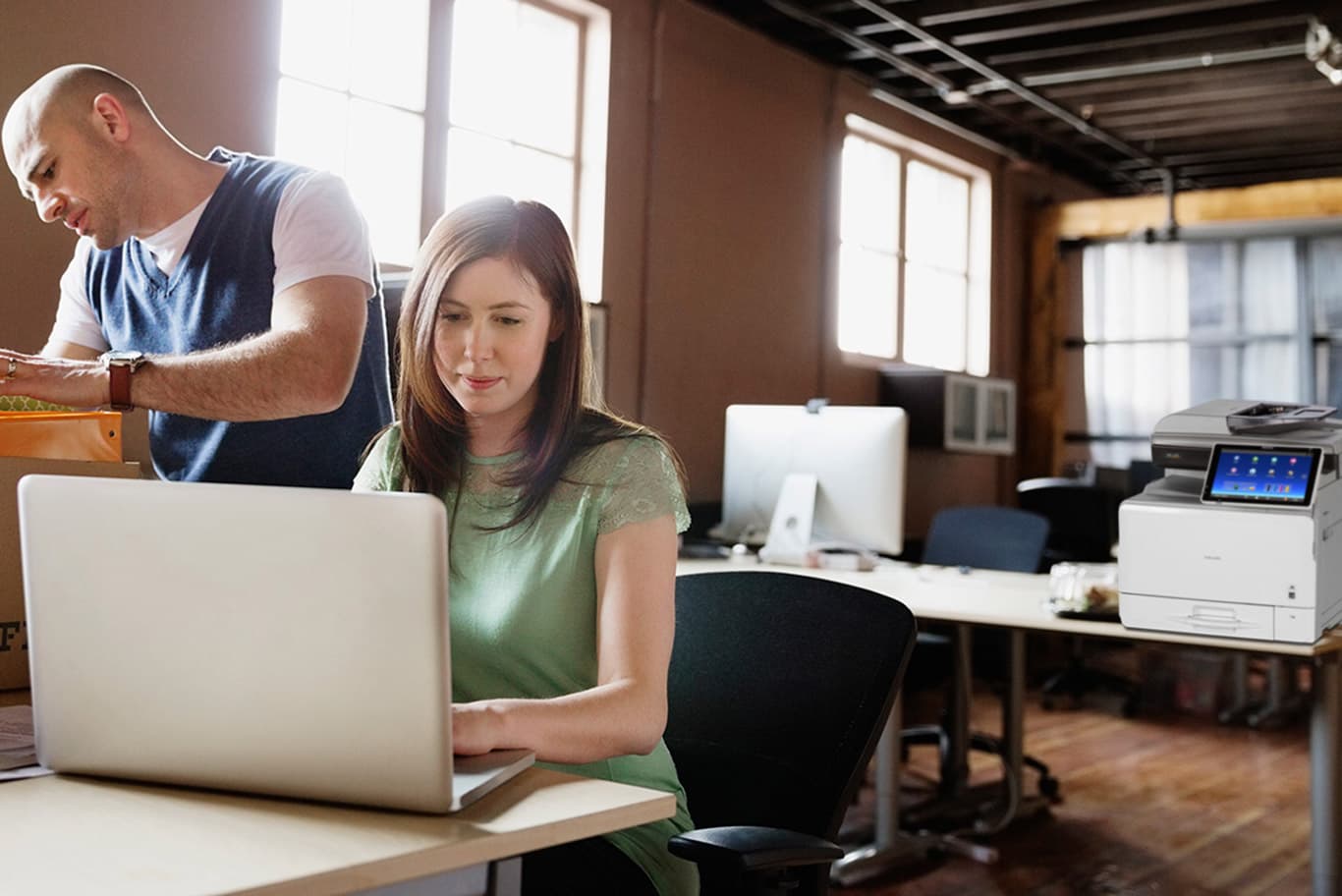 employees using printers for small business