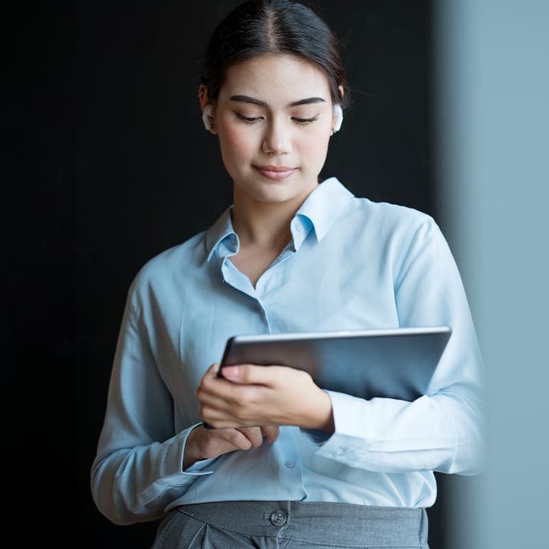Business woman working on tablet